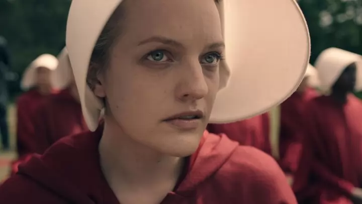 THE HANDMAID'S TALE -- The drama series, based on the award-winning, best-selling novel by Margaret Atwood, is the story of life in the dystopia of Gilead, a totalitarian society in what was formerly part of the United States. Facing environmental disasters and a plunging birthrate, Gilead is ruled by a fundamentalist regime that treats women as property of the state. As one of the few remaining fertile women, Offred (Elisabeth Moss) is a Handmaid in the Commanders household, one of the caste of women forced into sexual servitude as a last desperate attempt to repopulate a devastated world. In this terrifying society where one wrong word could end her life, Offred navigates between Commanders, their cruel Wives, domestic Marthas, and her fellow Handmaids  where anyone could be a spy for Gilead  all with one goal: to survive and find the daughter that was taken from her. Offred (Elisabeth Moss), shown. (Photo by: Take Five/Hulu)