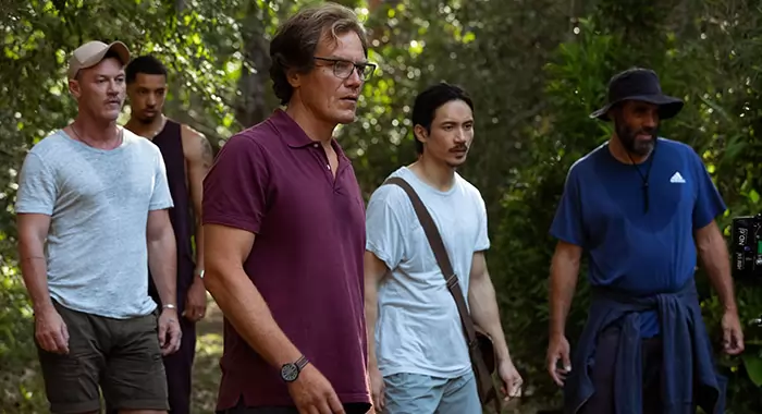 Nine Perfect Strangers -- “Earth Day” - Episode 103 -- Forced to live “off of the land” on Earth Day, tension within the group erupts as treatment intensifies and hunger pains set in. Lars (Luke Evans), Ben (Melvin Gregg), Napoleon (Michael Shannon), Yao (Manny Jacinto), and Tony (Bobby Cannavale), shown. (Photo by: Vince Valitutti/Hulu)