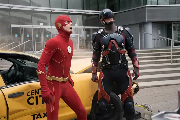The Flash -- "Armageddon, Part 1"" -- Image Number: FLA801a_0269r.jpg -- Pictured (L-R): Grant Gustin as The Flash and Brandon Routh as Ray Palmer/Atom -- Photo: Katie Yu/The CW -- © 2021 The CW Network, LLC. All Rights Reserved